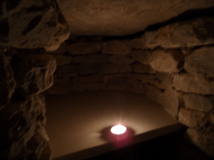 A candlelit niche onto which urns will be laid.